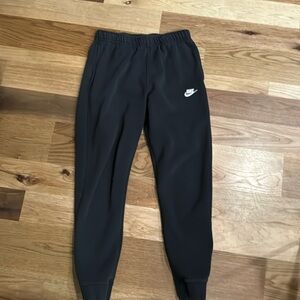 Nike Men jogger pants. Size Medium Tall. Black